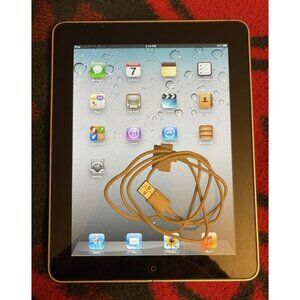 Nostalgia: First Generation iPad. WIFI only 16GB  w/ Charging cable